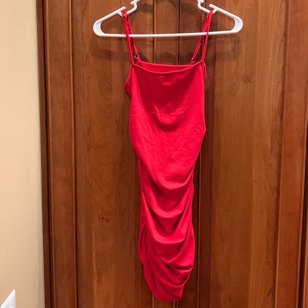 Red scrunched dress lightly worn.